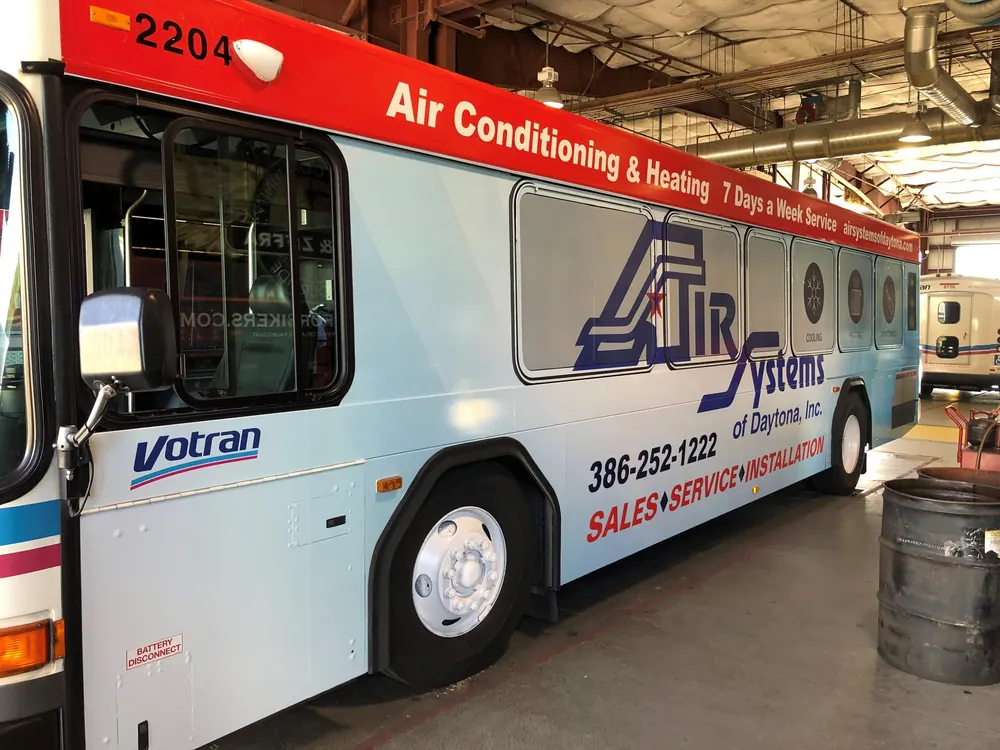 Air Systems of Daytona advertisement on the side of a Votran bus