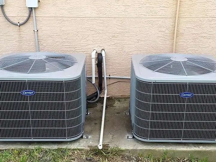 Two new condensers installed side by side at a Port Orange home