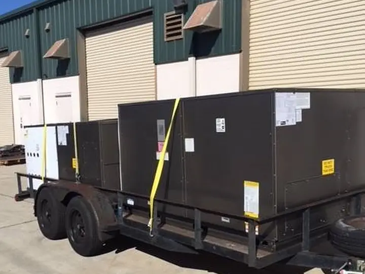 Trailer loaded with commercial rooftop units for delivery