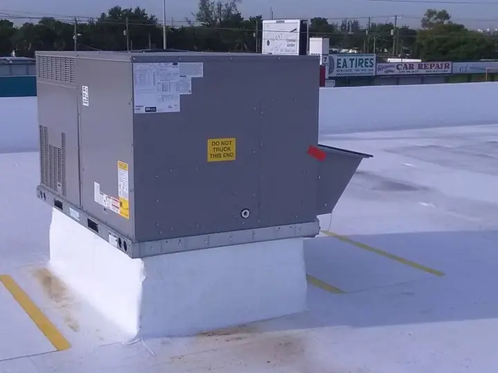Rooftop package unit on a raised curb