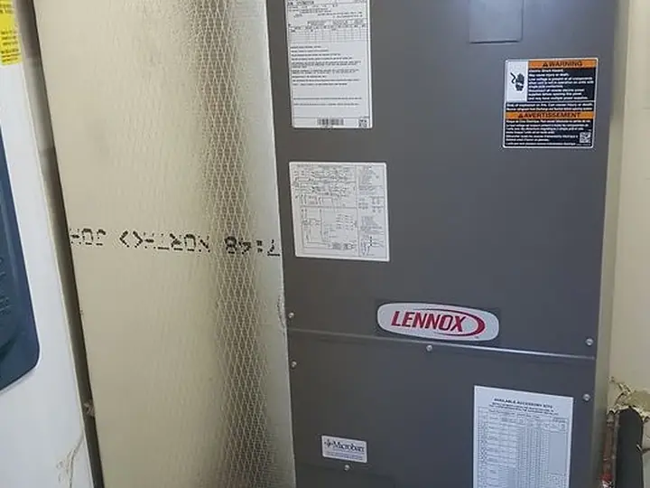Air handler installed in a utility closet