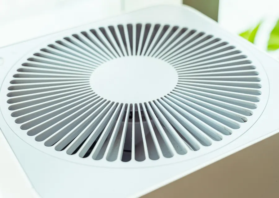 Close-up of a whole-house air purifier grille
