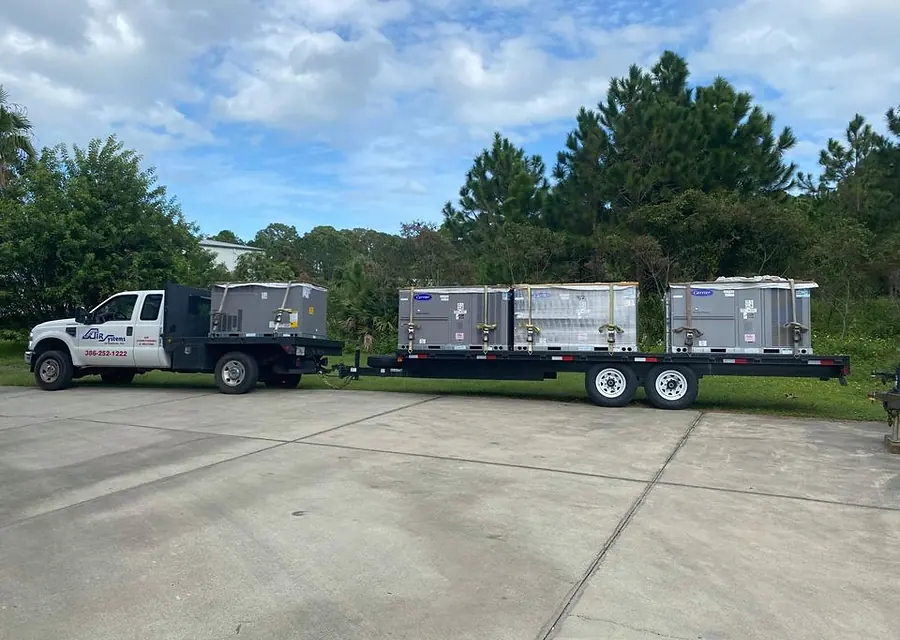 Air Systems of Daytona truck delivering new condensers to a job